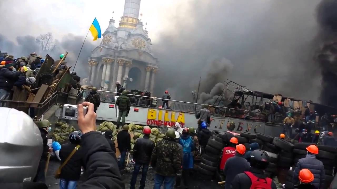 Maidan activists in Kyiv discussing ongoing safety threats and civil society risks after 2014 protests in Ukraine