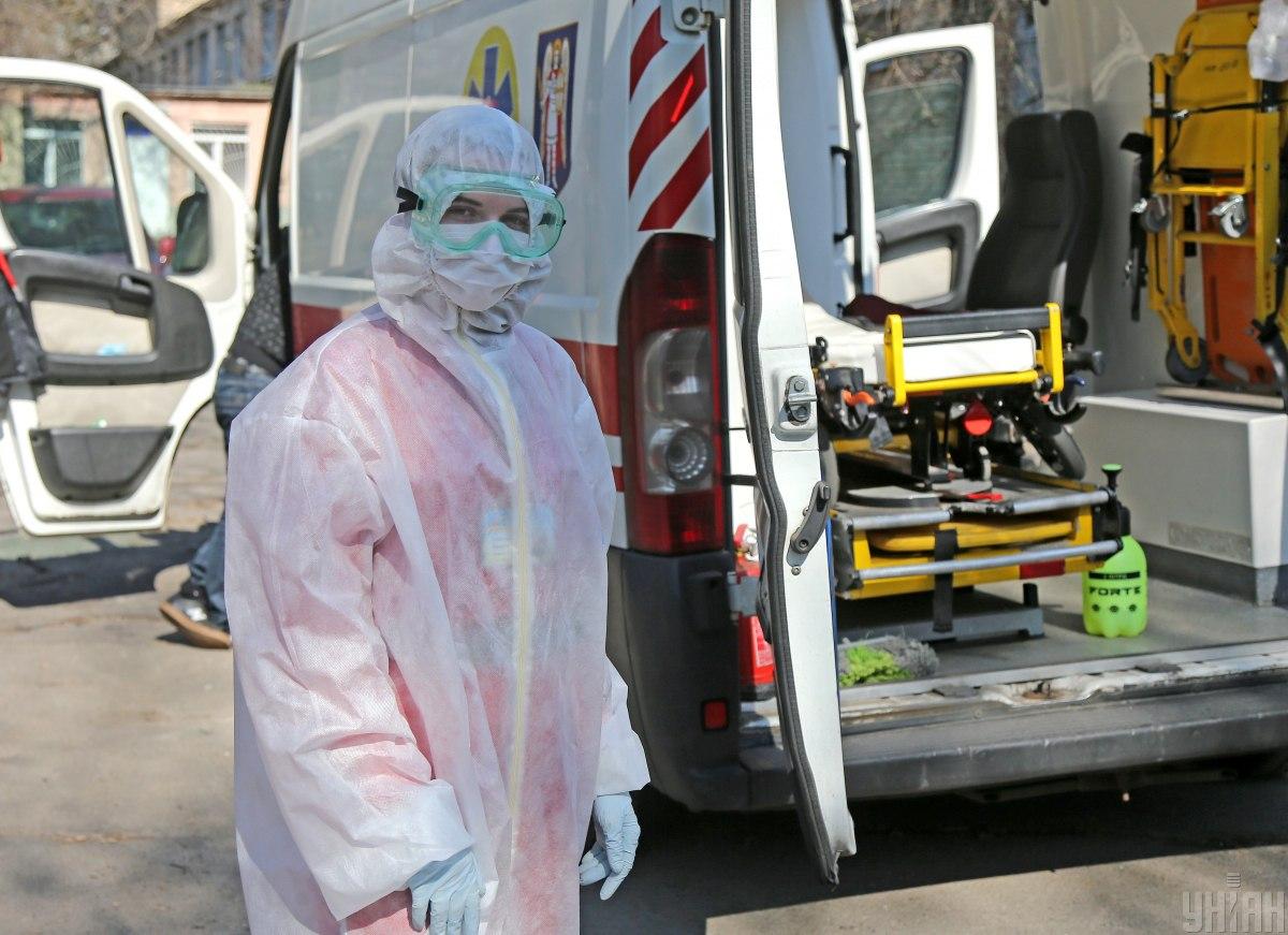Healthcare workers in protective gear during Ukraine COVID-19 Day 85 pandemic response
