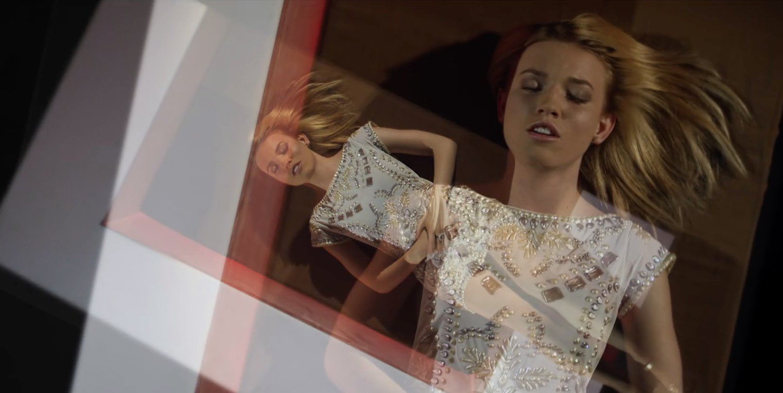 A provocative scene from the "Lobotomy" music video featuring a Ukrainian-American singer pushing artistic boundaries.