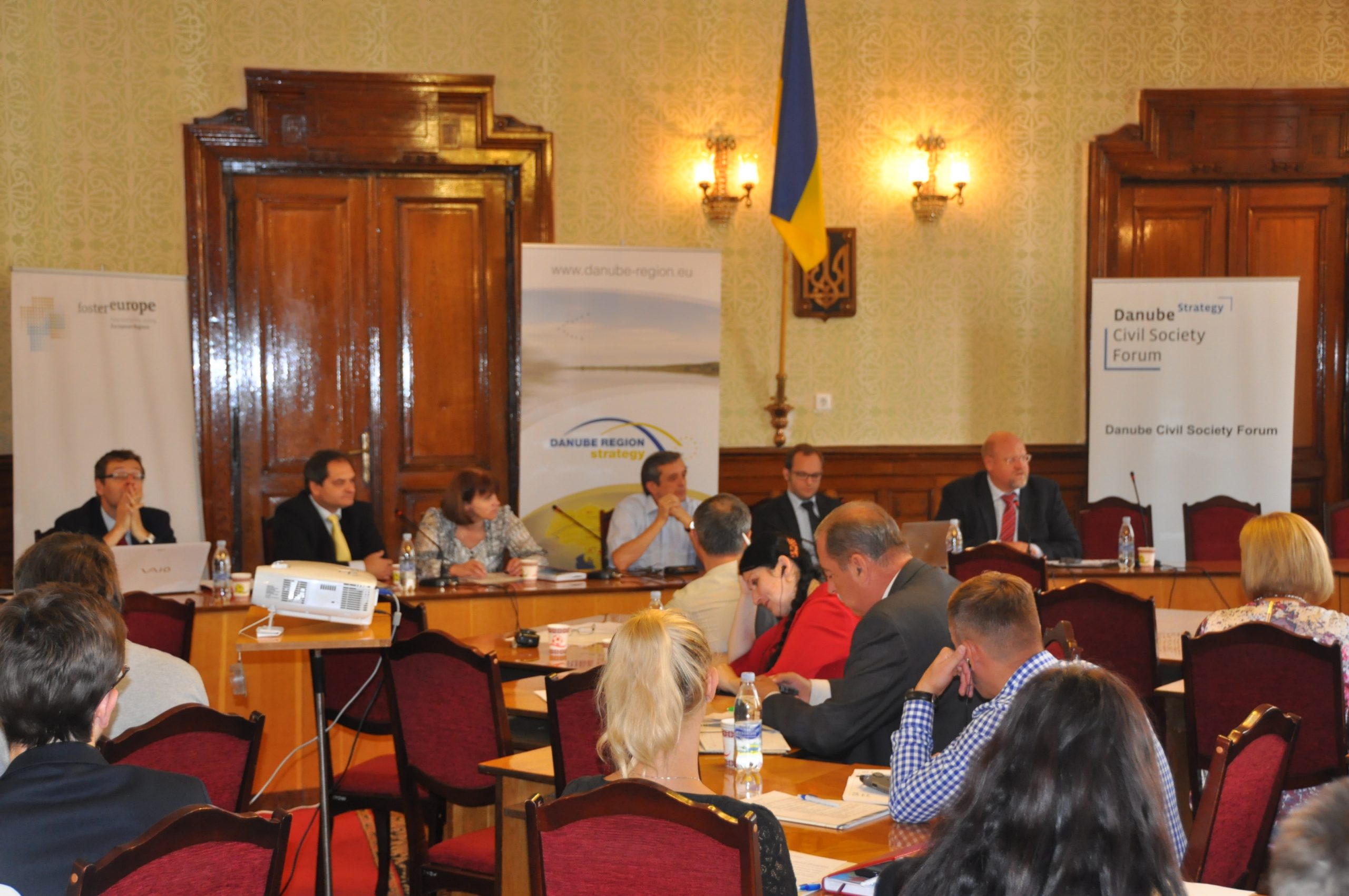 Ukraine flag alongside EU symbols representing Danube Region Strategy cooperation and European integration efforts