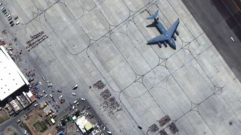 Chaos at Kabul airport during evacuation with military aircraft and civilians amid conflicting hijack reports in Afghanistan