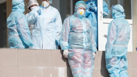 Healthcare workers in Ukraine monitoring COVID-19 patients during pandemic Day 554 with hospital response and testing operations