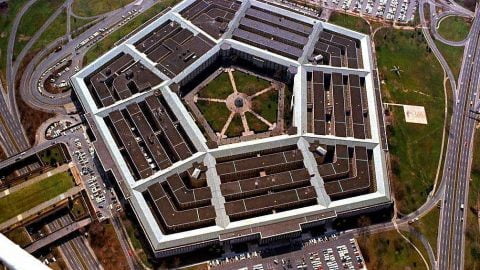 The Pentagon building in Washington DC illuminated, symbolizing US defense response amid rising Russia Ukraine tensions