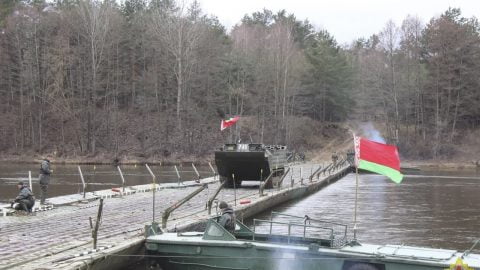 Military pontoon bridge spanning the Pripyat River near the Belarus–Ukraine border seen in satellite images, near the Chernobyl Exclusion Zone.