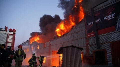 Ukrainian city damaged by heavy Russian shelling on March 17, 2022 with emergency crews aiding civilians amid intense fighting in daily war update.