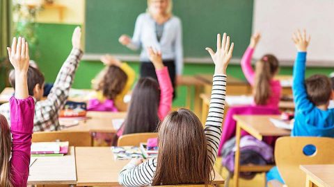 Ukrainian students and teachers return to school in one of 14 regions where education has resumed, classrooms filled with pupils and learning activity.