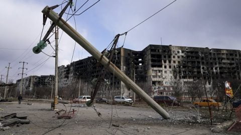 Ruined streets of Mariupol after Russian occupation showing destroyed buildings, debris and deserted neighborhoods that reflect siege and forced repression.
