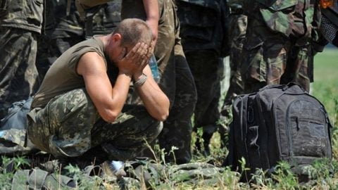 Ukrainian soldiers held in captivity, showing the faces of POWs who survived reported systematic torture and abuse by Russian forces under occupied detention