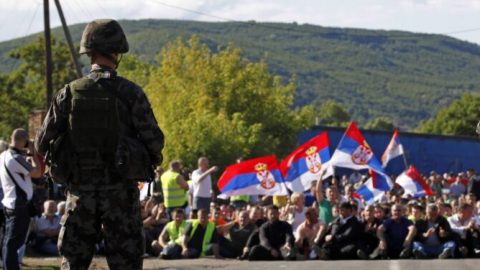 Protesters and barricades in northern Kosovo near Serbia border as tensions rise — a Balkan conflict with implications for Ukraine and wider European security.
