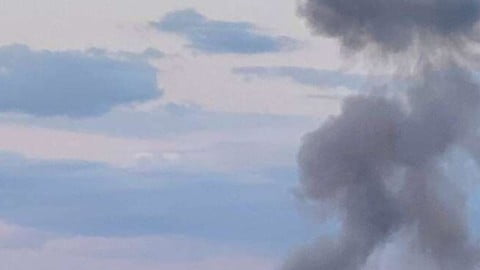 Missiles streaking through the sky over Ukraine during a massive Russian aerial attack involving 55 missiles and attack drones as air defenses respond