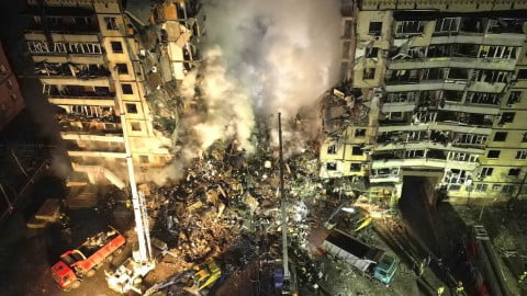 Aftermath of the Dnipro missile tragedy: wrecked apartment ruins, rescue teams at work and shattered urban landscape from a Russian strike. :contentReference[oaicite:1]{index=1}
