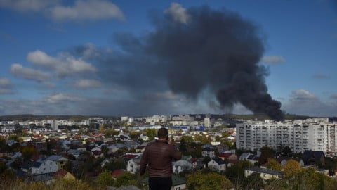 Air defense systems intercepting Russian missiles during a massive night attack on Ukrainian cities amid the ongoing Russia-Ukraine war