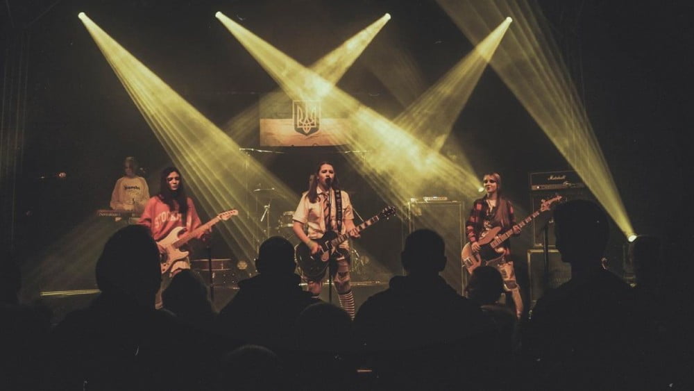 The Sixsters Ukrainian all‑girl punk rock band performing live and preparing to take the Glastonbury Festival stage in the UK