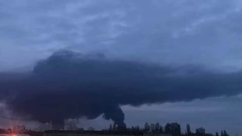 Explosions and smoke over Odesa at night after Russian missiles and drones hit the city in a retaliatory strike for Crimean Bridge damage.