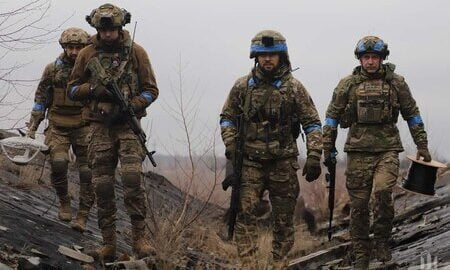Ukrainian soldiers hold frontline positions amid shelling and smoke as clashes and missile strikes intensify across regions