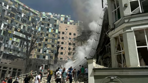 Ruined section of Okhmatdyt National Children’s Hospital in Kyiv after a Russian missile hit, showing collapsed structure beyond repair.