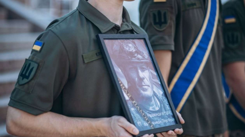 Funeral ceremony in Kyiv’s Independence Square for British combat medic Peter Fouche, honored by fellow fighters and civilians after his death.