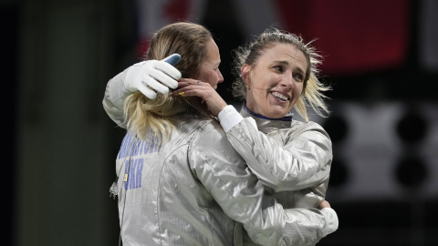 Ukrainian women's sabre fencing team celebrating Olympic gold victory at Paris 2024 after defeating South Korea in final