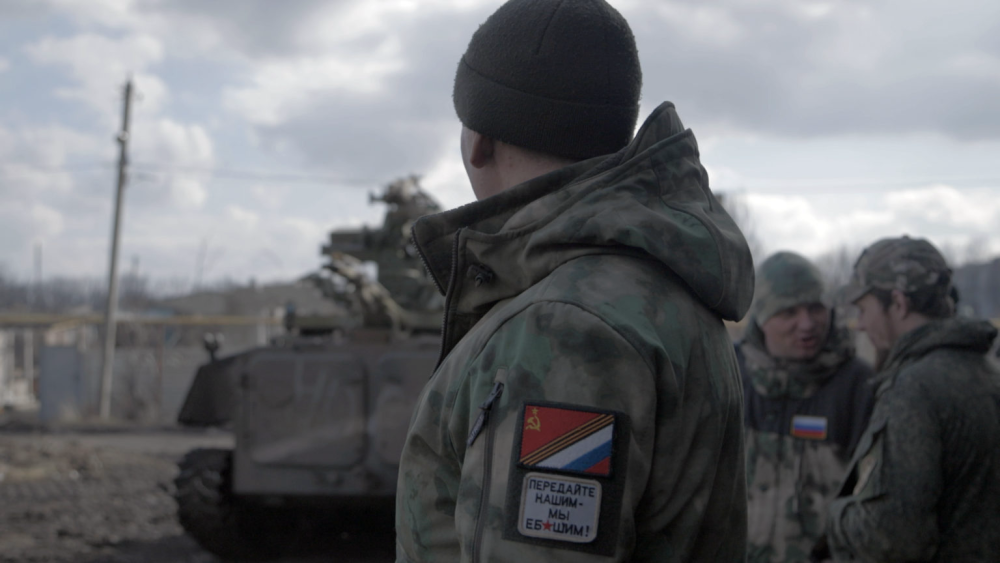 Festival audience and protestors outside an international film festival screening contested documentary *Russians at War* amid controversy and calls to cancel. :contentReference[oaicite:2]{index=2}