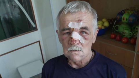 Zaporizhzhia street in Ukraine showing rubble and tension as reported pro-Russian thugs target relatives of Ukrainian soldiers in the region