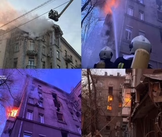 Night sky over Kyiv with anti‑air fire and exploding Shahed drones as Ukraine’s air defenses engage hostile UAVs during the New Year’s Eve attack.