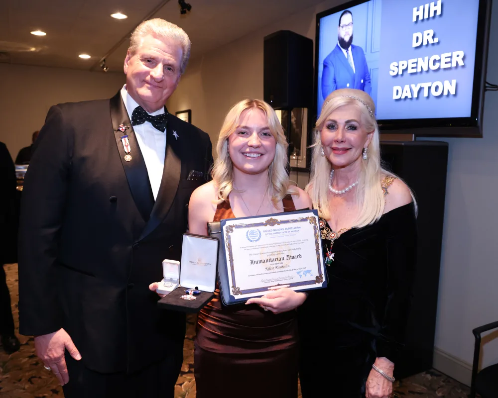 Kelsie Kimberlin receive the Royal Society of St. George Medal of Honor and UNA/USA Humanitarian Award for her creative advocacy for Ukraine, humanitarian efforts, and her precedent-setting legal initiative under the State Sponsors of Terrorism Act