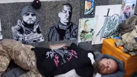 Ukrainian veteran Serhiy Yanyuk on a hunger strike at Independence Square protesting the disputed military cemetery plan in Kyiv.