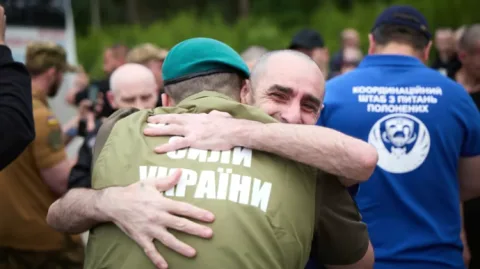 Ukrainian POWs just freed in a new exchange embrace loved ones, including fighters once listed as missing in action returning home.