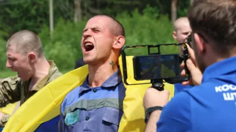 Ukrainian prisoners of war returning home during the phased Istanbul prisoner exchange with Russia under the peace talks agreement.