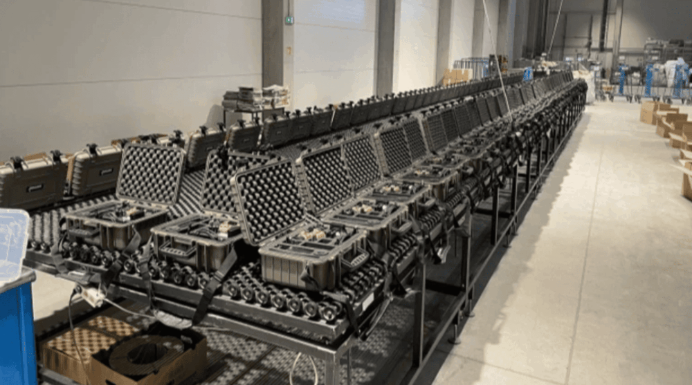 Archer’s thermal imaging equipment at production site with CEO Yaremenko and factory exterior in Ukraine business context.