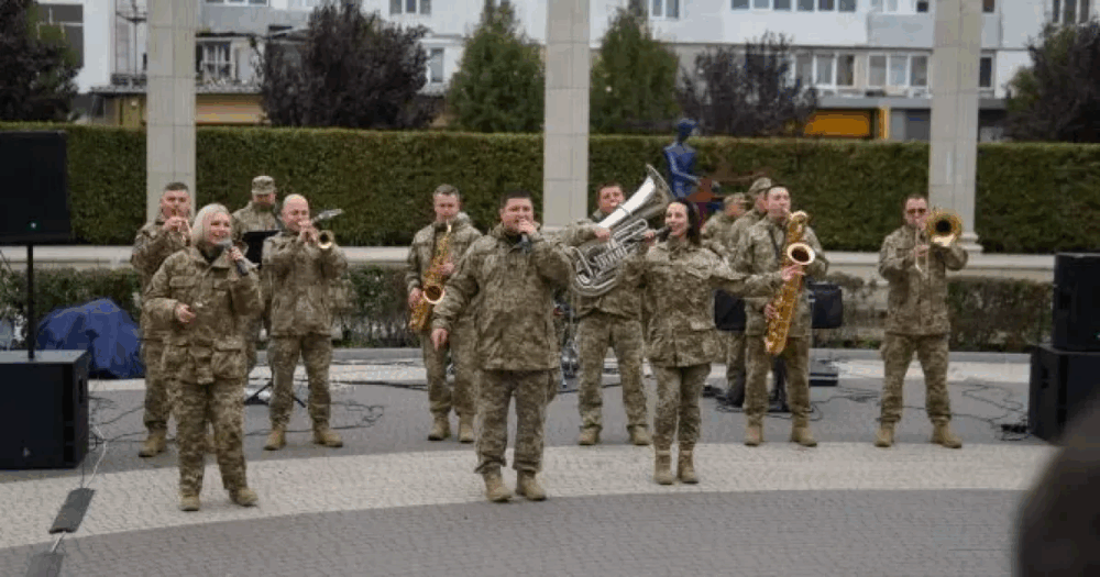Armed Forces Orchestra and Unbreakable ensemble performing at a charity concert in Irpin, inspiring locals with patriotic and uplifting music. EMPR.media