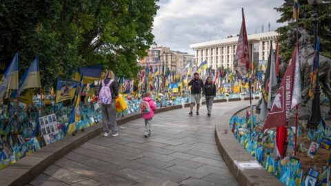 Maidan in Kyiv with memorial and Ukrainian flags honoring fallen heroes of the war, symbolizing national sacrifice and memory
