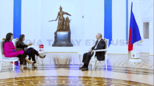 Portraits of Vladimir Putin and destroyed eastern Ukraine city – war and occupation 2025