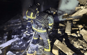 Emergency responders at Kryvyi Rih after missile strike December 2025