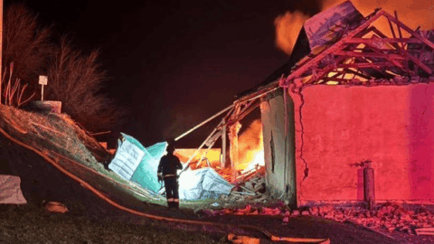 Firefighters at energy facility damaged by drone strike in Odesa region December 2025