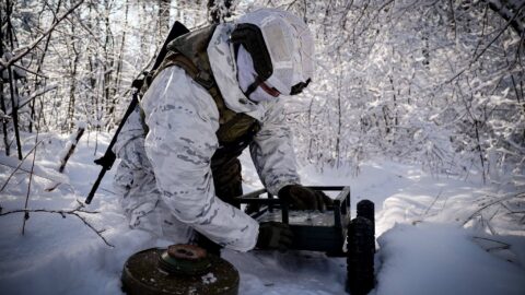 Ukrainian soldiers in winter frontline battle with snow, smoke and drones above, symbolizing fierce combat on Jan 25  2026