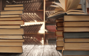 Stack of newly translated Ukrainian books for European audiences featuring works by Khvylovyi, Yohansen and Grusha on display.