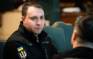 Kyrylo Budanov shakes hands with Zelenskyy after being appointed head of Ukraine’s Presidential Office amid high‑stakes political reshuffle in Kyiv.