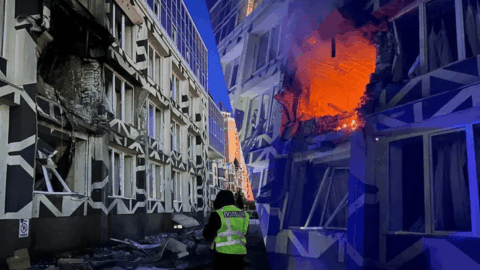 Emergency responders at the scene of a damaged hospital in Kyiv after a Russian drone strike, with fire trucks and smoke visible. :contentReference[oaicite:2]{index=2}