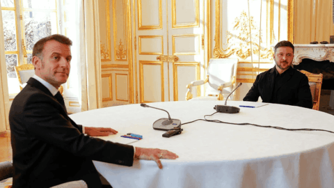 Ukrainian President Volodymyr Zelenskyy and French President Emmanuel Macron speaking during their meeting in Paris to align on air defense and diplomatic strategy ahead of Coalition talks. :contentReference[oaicite:2]{index=2}