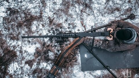 Ukrainian soldiers in winter frontline positions amid smoke and explosions during Jan 16, 2026 clashes, highlighting fierce war intensity