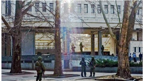 Russian troops and Black Sea Fleet ships during 2014 Crimea occupation, showing armored vehicles, special forces, and key military bases.