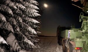 Ukrainian city under drone attack with smoke rising, frontline soldiers in combat, Feb 10 2026 conflict | empr.media