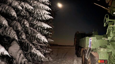 Ukrainian city under drone attack with smoke rising, frontline soldiers in combat, Feb 10 2026 conflict | empr.media