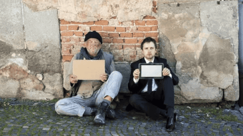 Ukrainian small business owner working at laptop reviewing finances as rising taxes and new rules impact sole proprietors