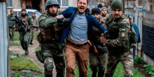Ukrainian soldiers and recruitment officers amid mobilization efforts, highlighting debate over military reform and conscription policy