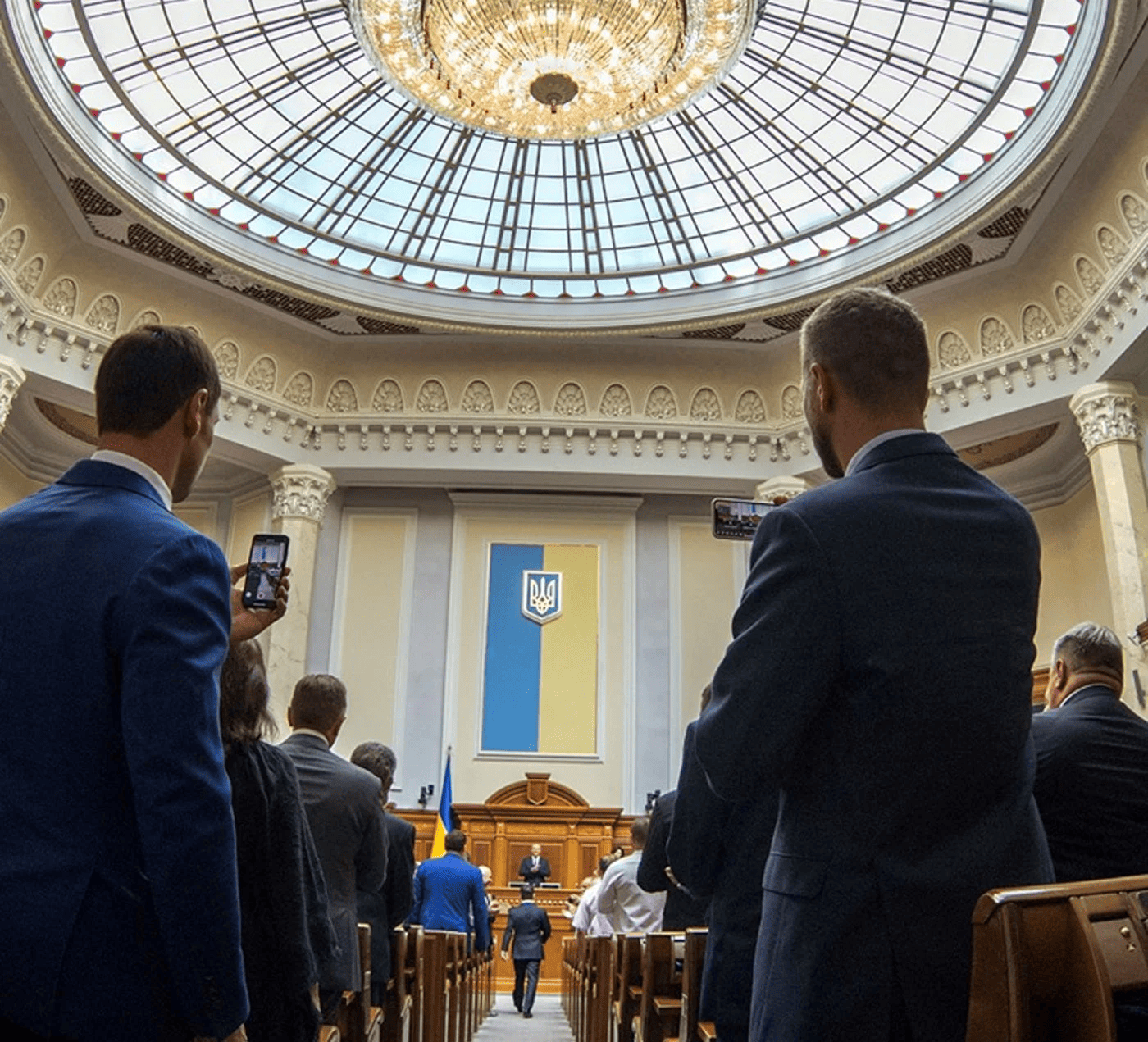 Ukrainian and EU flags near government buildings in Kyiv symbolizing debate over stalled reforms and uncertainty around Ukraine’s EU readiness