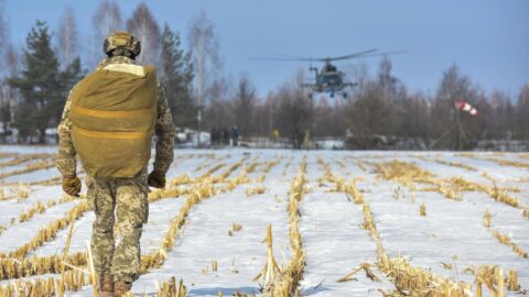 Ukrainian frontline under heavy drone and artillery attacks with smoke rising as Russian forces advance toward key eastern cities in March 2026.