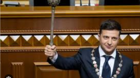 Zelenskyy holding ceremonial staff in Ukraine's Parliament
