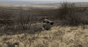 Ukrainian soldiers in intensive combat training simulating slow and dangerous frontline advances under modern warfare conditions